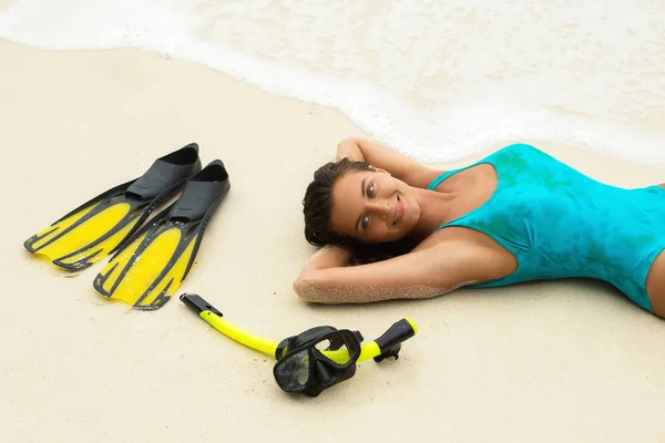 Young woman  with a mask for snorkeling. Summer and beach holidays.
