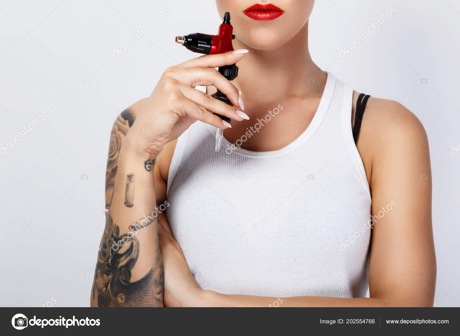 Hand with tattoo machine design element Royalty Free Vector