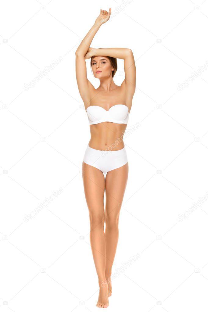 Young woman with beautiful body isolated on white background