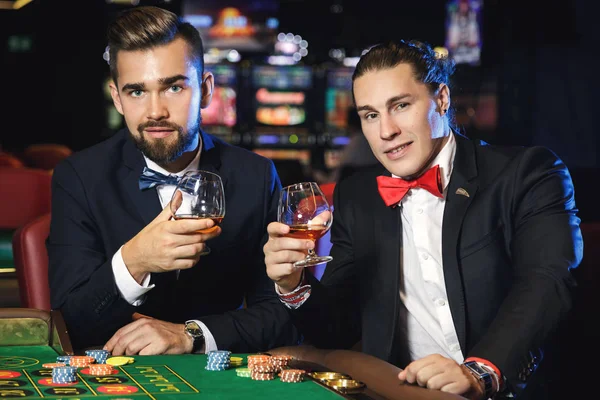 Two Handsome Guys Drinking Cognac Casino — Stock Photo, Image