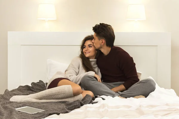 Young Couple Wearing Warm Sweaters Sitting Bed — Stock Photo, Image
