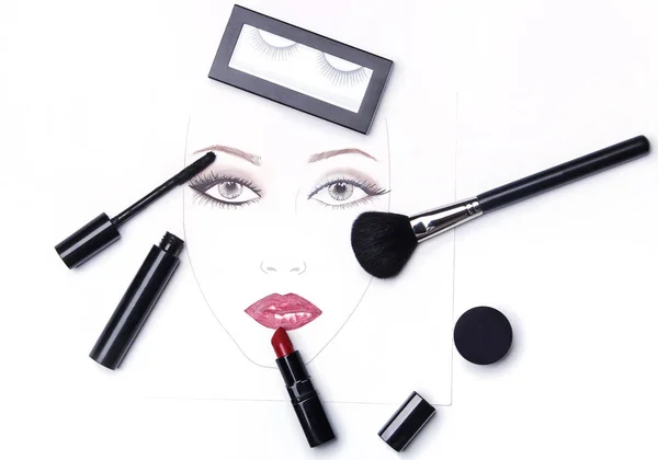 Face chart and different makeup objects and cosmetics