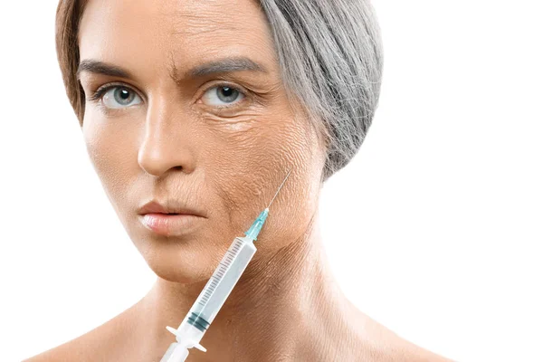 Young and old face comparison. Woman with syringe. — Stock Photo, Image