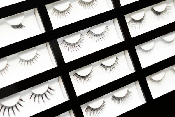 Samples of artificial eyelashes in the cosmetic shop