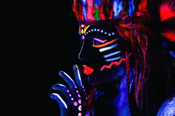 Woman with a neon makeup in ultraviolet light — Stock Photo, Image