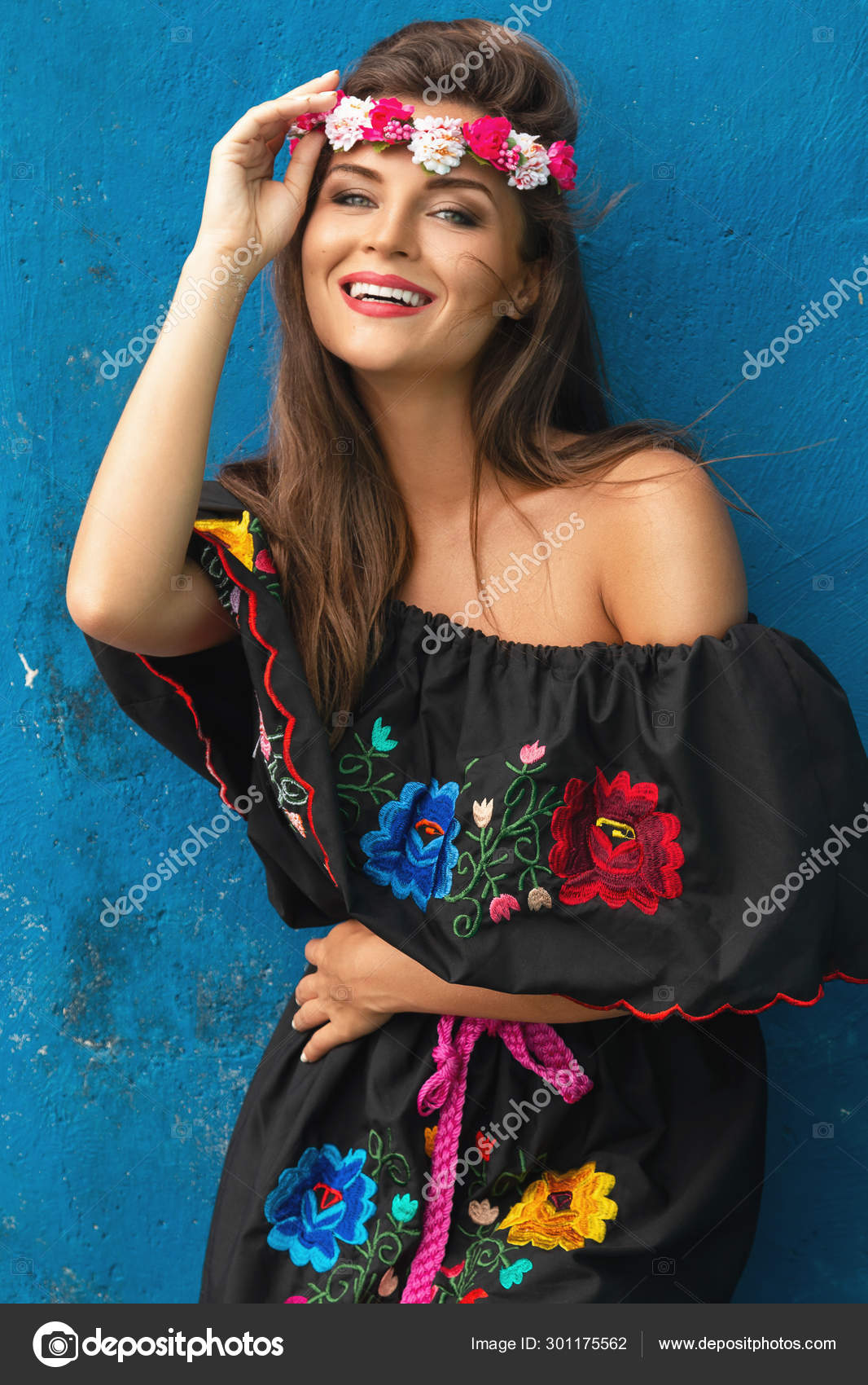 https://st4.depositphotos.com/2060347/30117/i/1600/depositphotos_301175562-stock-photo-young-beautiful-woman-wearing-traditional.jpg