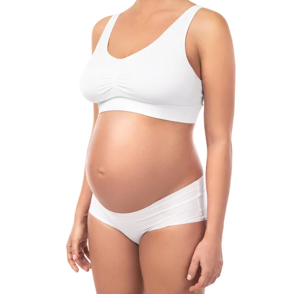 Büyük Göbekli Hamile Kadın Beyaz Arka Planda Çamaşırı Giyiyor — Stok fotoğraf