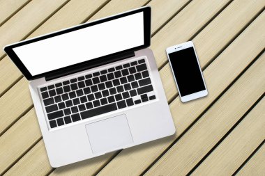 üstten görünüm bilgisayar nootebook ahşap arka plan üzerinde