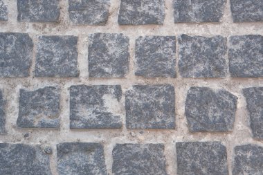 Kaldırım ile eski taş kaplı olduğu. Gri retro taş doku. Antik tuğla.