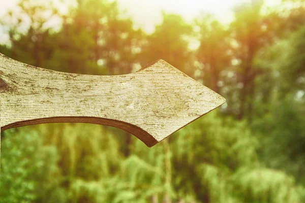 Wooden vintage pointer. Vertical view of rustic handmade wooden sign. Direction to right. Mockup.