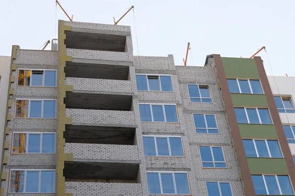 Building and Construction site of new home. House under construction. House under construction at building site.