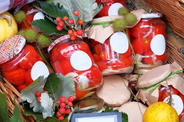 Fermented food concept. Jars with homemade pickled or fermented  colorful vegetables in farmer agricultural market. Farm product in local market. Rural style.