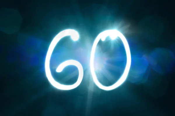 Sixty Numbers written with a flashlight during long exposure — Stock Photo, Image