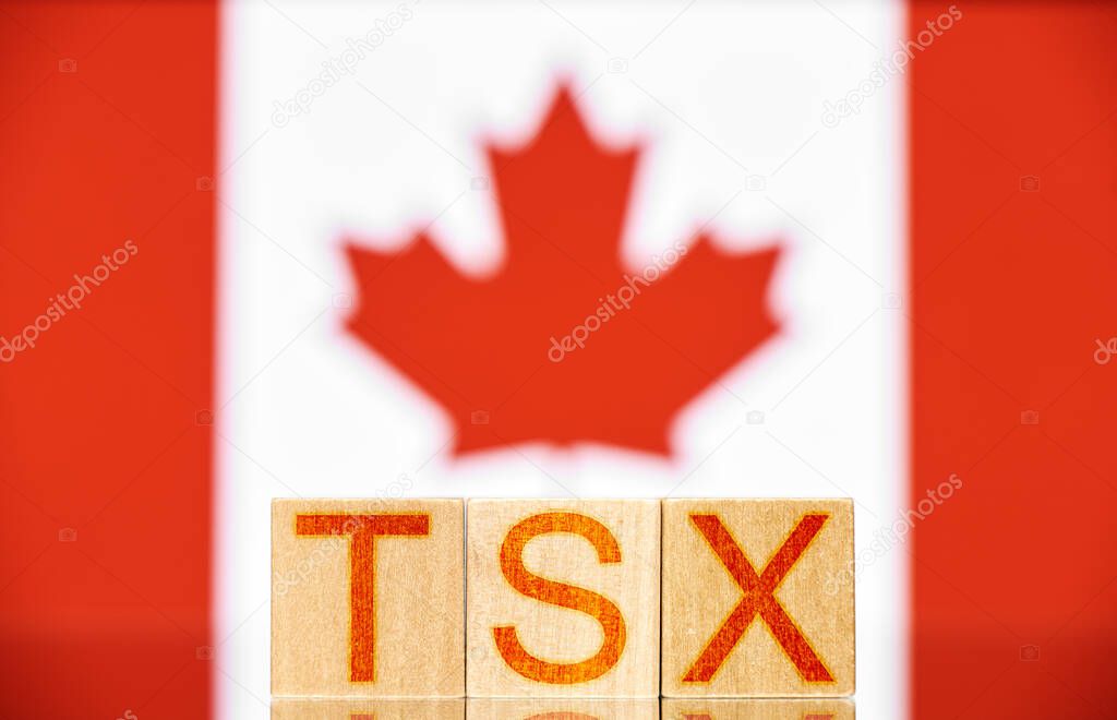 tsx. wooden blocks with tsx lettering on canada flag background