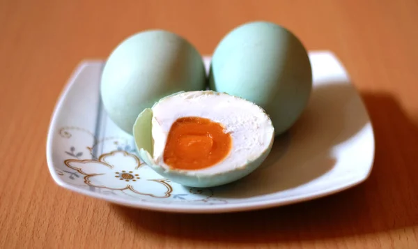 Salted duck egg with wood background