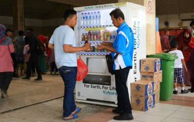 Jakarta, Indonesia - November 8, 2017: Beverage vending machine at Tanah Abang Railway Station.