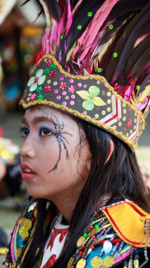 Jakarta, Indonesia - May 13, 2018: Girl dancing Topeng Ireng, (literally Black Mask) in East Jakarta. Topeng Ireng is folk dance from Central Java. 