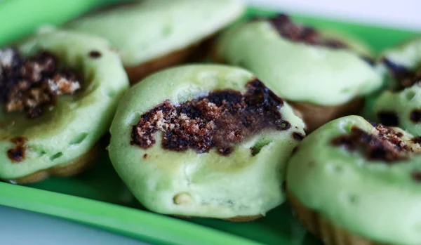 Pinch Cake or kue cubit on white background. Traditional Indonesian cakes normally sold by street vendors.