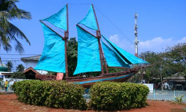 Jakarta, Indonesia - September 1, 2019: Phinisi  boat monument at the Sunda Kelapa Harbor. clipart