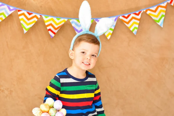 Little Cute Boy Bright Striped Raglan Rabbit Ears Smiles Holds — Stock Photo, Image