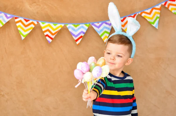 Little Cute Boy Bright Striped Raglan Rabbit Ears Smiles Holds — Stock Photo, Image