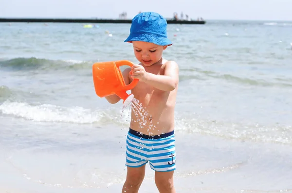 Cute Little Boy Beach Blue Striped Swimming Trunks Runs Waves — Stock Photo, Image