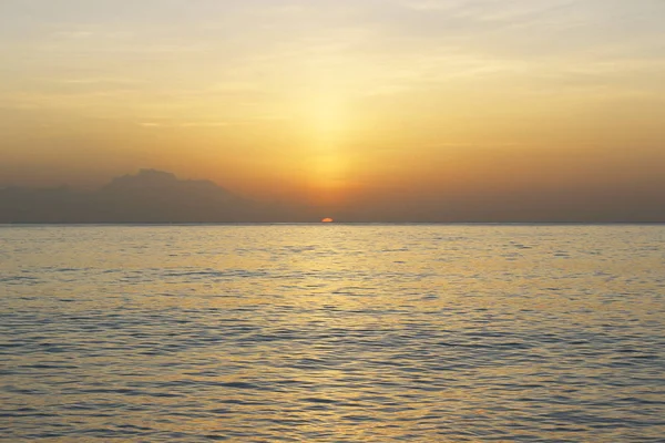 Barbados yellow orange sunset and blue ocean