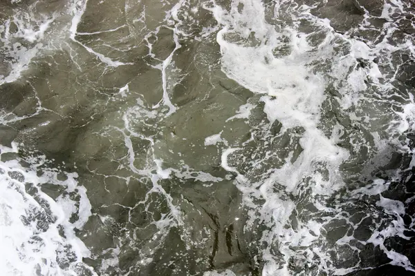 Primer Plano Playa Océano Espuma Agua Textura Ondas Salpicaduras — Foto de Stock