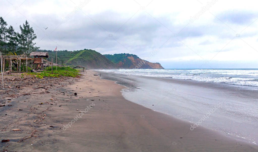 Lateral view of the Ayampe fishing beach, early in the morning on an overcast day. Ayampe, Manabi, Ecuador
