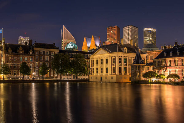 Dutch historical parliament buildings named binnenhof. In the centre, museum Mauritshuis with inside lot of old dutch paintings
