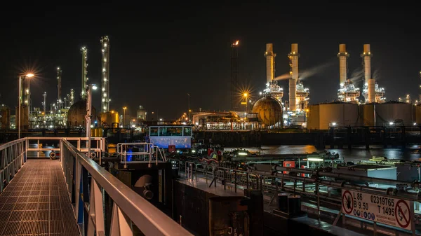 night view of industrial port in Rotterdam, Netherlands
