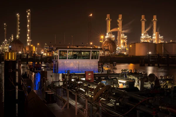 night view of industrial port in Rotterdam, Netherlands