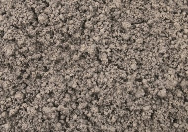 Kahverengi toprağın köstebek ile arka plan doku gevşetti.