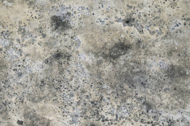 Beton duvardaki küf, kir ve yongalar arka plan dokusu.