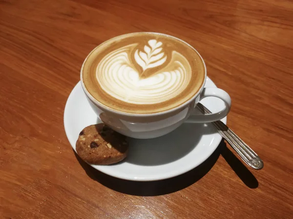 Latte Art Biscuit Spoon Wooden Table — Stock Photo, Image