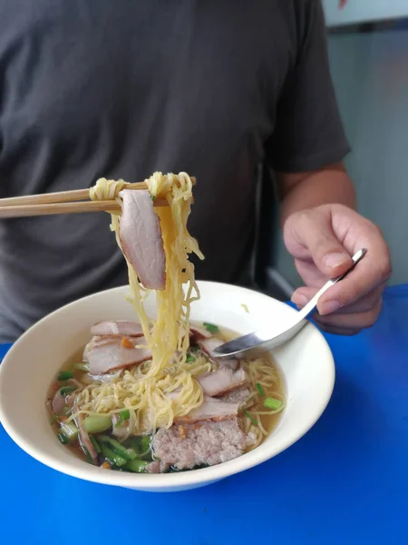 Man Eat Egg Noodle Roasted Pork Chopsticks Spoo — Stock Photo, Image