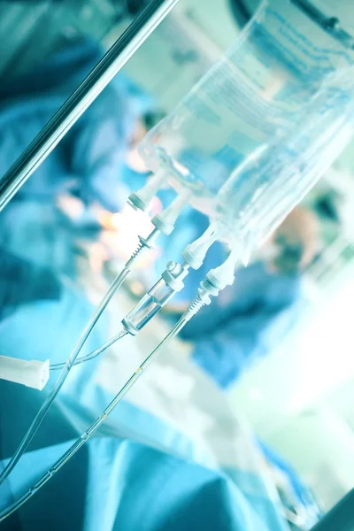 Hanging Drip Bag Saline Background Working Hard Team Surgeons — Stock Photo, Image