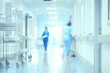 Koridor klinik uzmanları tıbbi arka plan bulanık