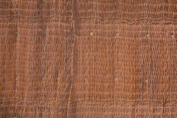 Тканина з солом'яної тканини з нерівною структурою, фактурним фоном — стокове фото