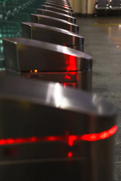 Automatic barriers for control people entered in railway station or in metro, red and green light, necessary tickets, new technologies in habitual life, automatic open and close doors