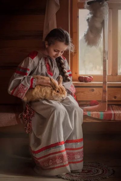 girl in Russian traditional dress, Russian national setting, bunny in hand, pushy pet, retro style