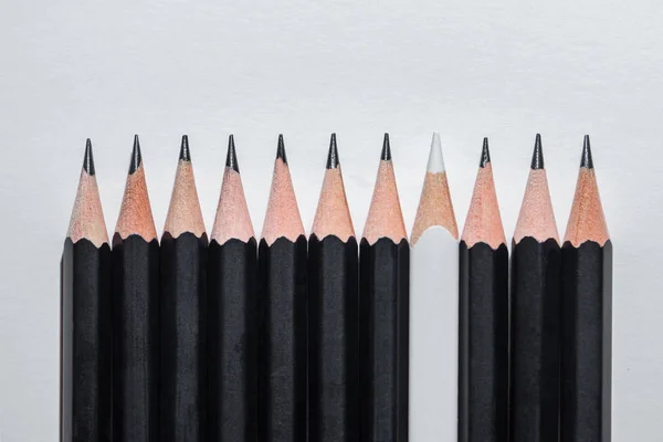 Simple Black Identical Pencils White Background One White Pencil Concept — Stock Photo, Image