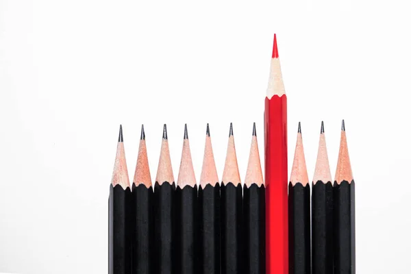 Red Pencil Standing Out Crowd Identical Black Pencils White Background — Stock Photo, Image