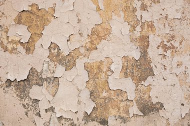 Duvardaki eski çatlak boya dokusu, eski alçı.