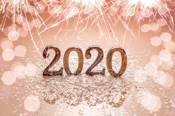 holiday background,  new year 2020 golden number on bright  brilliant background