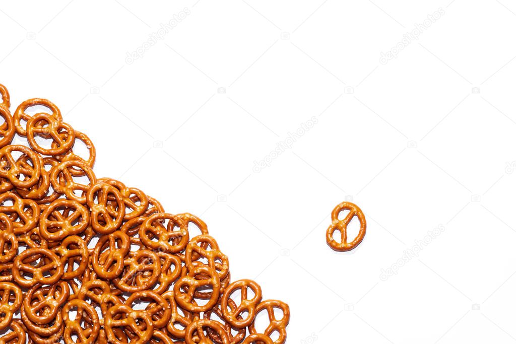 Bretzels with salt on a white plate, a traditional Bavarian beer snack