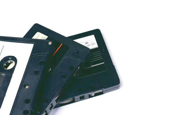 Audio retro vintage  groupe of audio cassetes tape 80s style blue vintage toning  isolated on white