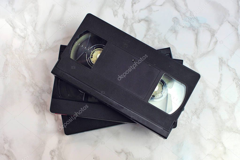 Video vhs retro vintage cassette tape 70s, 80s, 90s style on pink background