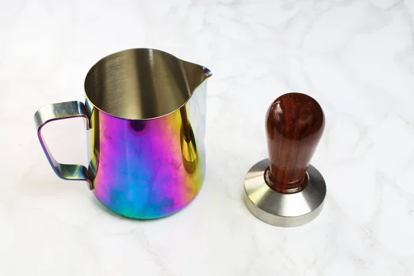 coffee latte and cappuccino milk pitcher rainbow multicolor, wooden professional tamper for ground coffee with wooden handle. Barista kit
