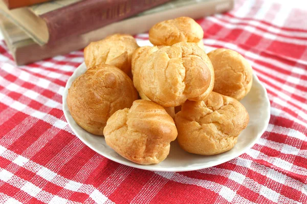 Bitten Homemade Small Cakes Profiterole Choux Pastry Custard Next White — Stock Photo, Image